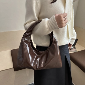 Fashionable dark brown patent leather tote bag with a high-gloss finish for women