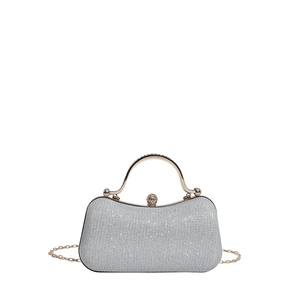 Elegant silver glitter evening bag with gold handle and sparkling crystal ball clasp