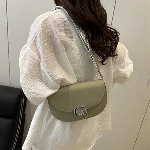 Chic multi-layer saddle shoulder bag in light green lychee leather with woven strap