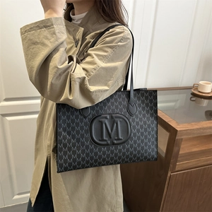 Harajuku style black tote bag featuring M-pattern print and embossed letter logo