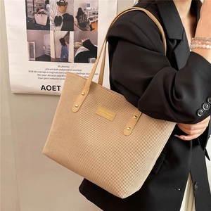 Retro corduroy tote bag in khaki with leather straps and large capacity for daily commuting