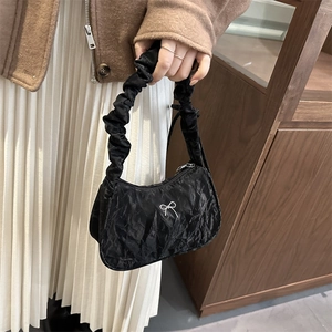 Minimalist black pleated cloud hobo bag with white bow embroidery for women