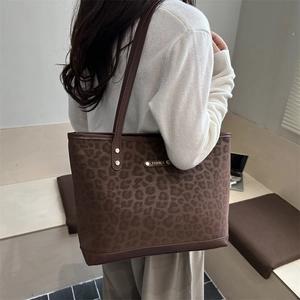 Retro leopard print tote bag with brown leather straps and fashion metal hardware detail