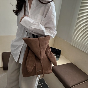 Fashionable dark brown faux suede backpack with cute rabbit ears and drawstring closure