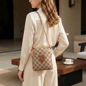 Chic retro checkerboard crossbody phone bag with brown leather strap and metal clasp