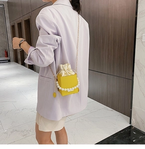 Fashionable mini square box crossbody bag in yellow PU leather with pearl chain handle