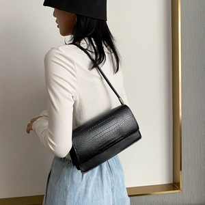 Chic black crocodile pattern baguette bag with gold buckle for women in daily use