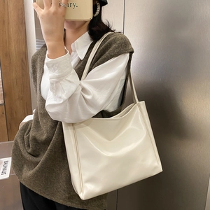 Minimalist cream leather tote bag for women, spacious shoulder bag for daily commute