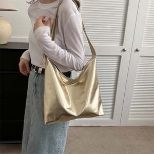 Metallic gold tote bag for women with a minimalist minimalist hobo shoulder bag design