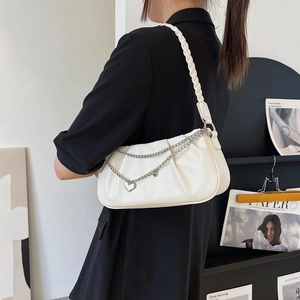 Minimalist cream white pleated underarm bag with metal chain and heart pendant accessory