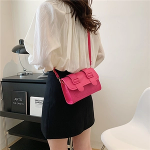 Chic rose pink PU leather crossbody square bag with gold hardware and dual buckle straps
