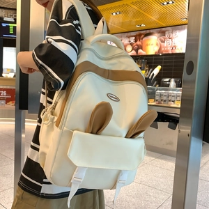 Minimalist white campus backpack with cute rabbit ears and stylish brown strap details