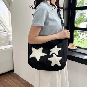 Minimalist black tote bag with white plush star patches for students and daily commuting