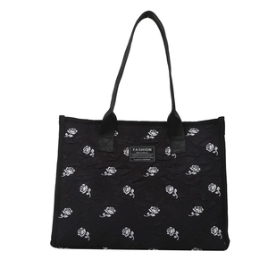 Black large capacity tote bag with white rose floral print and top handles for women