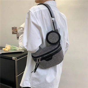 Minimalist black and white rhinestone saddle bag with adjustable striped strap and coin pouch