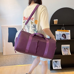 Lightweight purple sports duffel bag for women's yoga and gym with wide shoulder straps