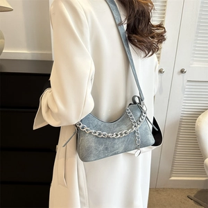 Fashionable grey-blue crescent shoulder bag with vintage matte finish and silver chain strap