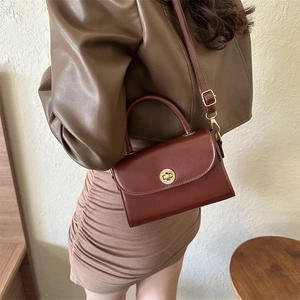 Retro deep red leather crossbody square bag with a vintage gold circular lock