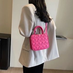 Bright rose pink quilted handbag with diamond pattern and silver metal handles for women