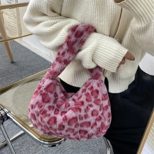 Chic pink leopard print faux fur tote bag for women with a trendy half-moon shape
