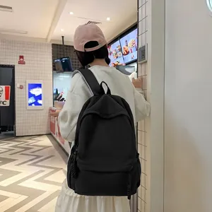 Minimalistischer schwarzer Nylon-Rucksack für Schüler mit großem Fassungsvermögen