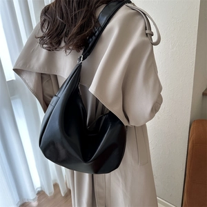 Minimalist black matte leather large hobo shoulder bag for modern commuter fashion