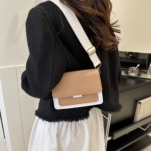 Minimalist small square crossbody bag with contrast stitching and jacquard strap