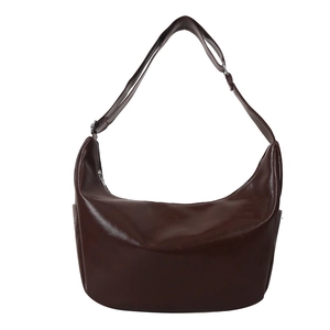 Minimalist dark brown crescent underarm bag with adjustable strap and silver hardware