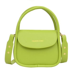 Chic lime green small square crossbody bag with gold text and top handle detail