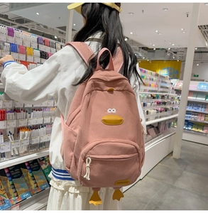 Pink corduroy school backpack with cartoon duck embroidery and 3D feet detail