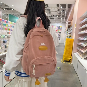 Pink corduroy backpack for kids featuring cute cartoon duck details and large capacity