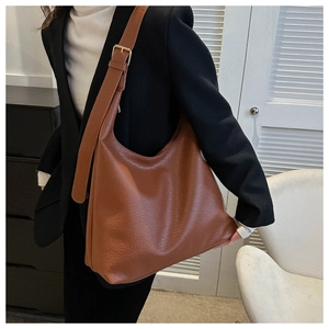 Brown lychee-patterned leather hobo bag with adjustable strap and golden hardware