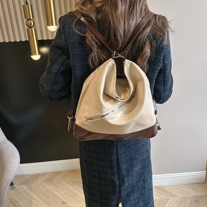 Sac à dos bicolore élégant pour femme avec bretelles en cuir marron et corps beige moderne