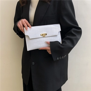 Chic white crocodile embossed envelope clutch bag with a golden metallic lock closure