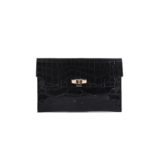 Classic black crocodile texture envelope clutch bag with elegant golden twist lock detail
