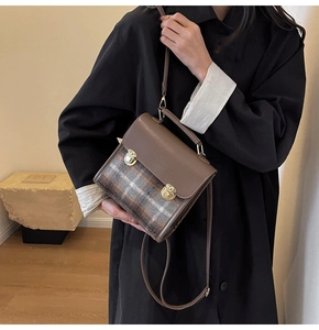 Brown vintage checkered leather crossbody bag shown on model for daily casual outfit