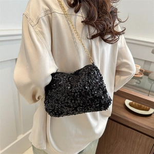 Chic black sequin handbag with gold chain strap for elegant casual spring fashion