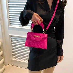 Hot pink faux crocodile square handbag with golden rhinestone bow and ruched handle