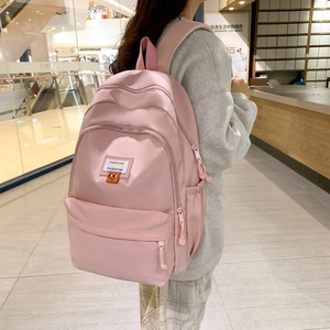Pink minimalist casual backpack for school with fashion patches and waterproof fabric