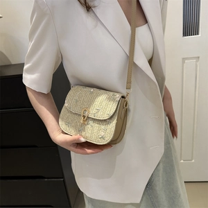 Floral embroidered beige straw crossbody bag with khaki strap and gold U-shaped lock