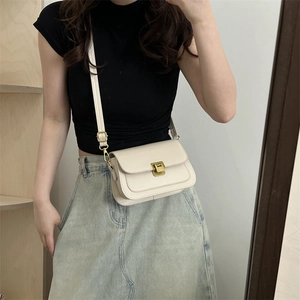 Minimalist beige rectangular crossbody bag with vintage gold square buckle clasp