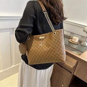 Vintage geometric pattern brown tote bag with gold chain and matching mini coin purse
