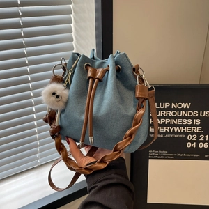 Women's Denim Bucket Bag With Braided Handle Drawstring Closure Casual Crossbody Shoulder Bag With Plush Charm