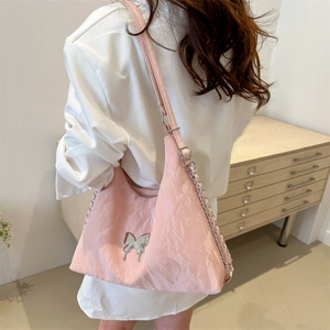 Sac fourre-tout rose chic pour femme avec bandoulière chaîne et décor papillon argenté