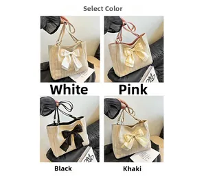 Sacs cabas en paille tissée blanc, rose, noir et kaki avec grand nœud décoratif
