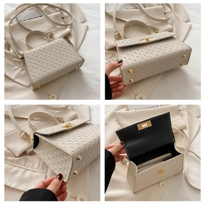 Detail of cream woven leather handbag featuring gold metal twist lock and durable bottom studs