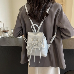 Silver mini bow backpack with metallic finish for women, stylish Korean fashion style