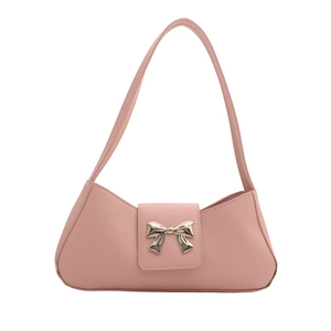 Pink leather baguette bag with a silver metallic bow decoration on a white background