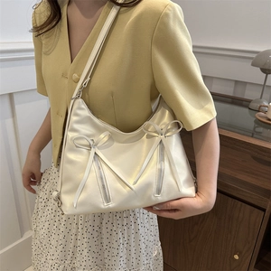 Sac sous le bras blanc crème à la mode avec nœuds et fermetures éclair en métal