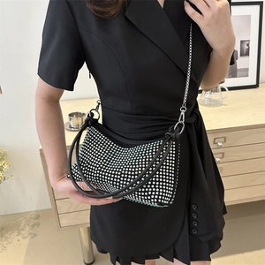 Elegant black rhinestone underarm bag with blue crystals and silver chain strap